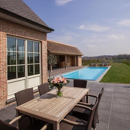 Moderne villa met zwembad en poolhouse Brakel Buitenkant foto