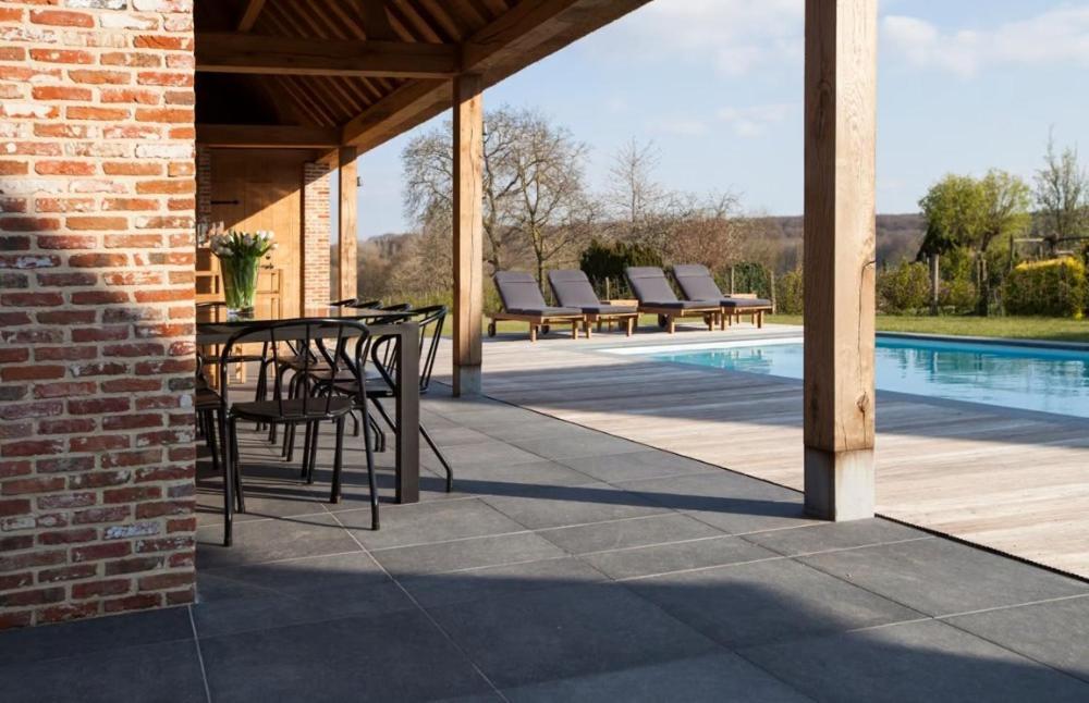 Moderne villa met zwembad en poolhouse Brakel Buitenkant foto